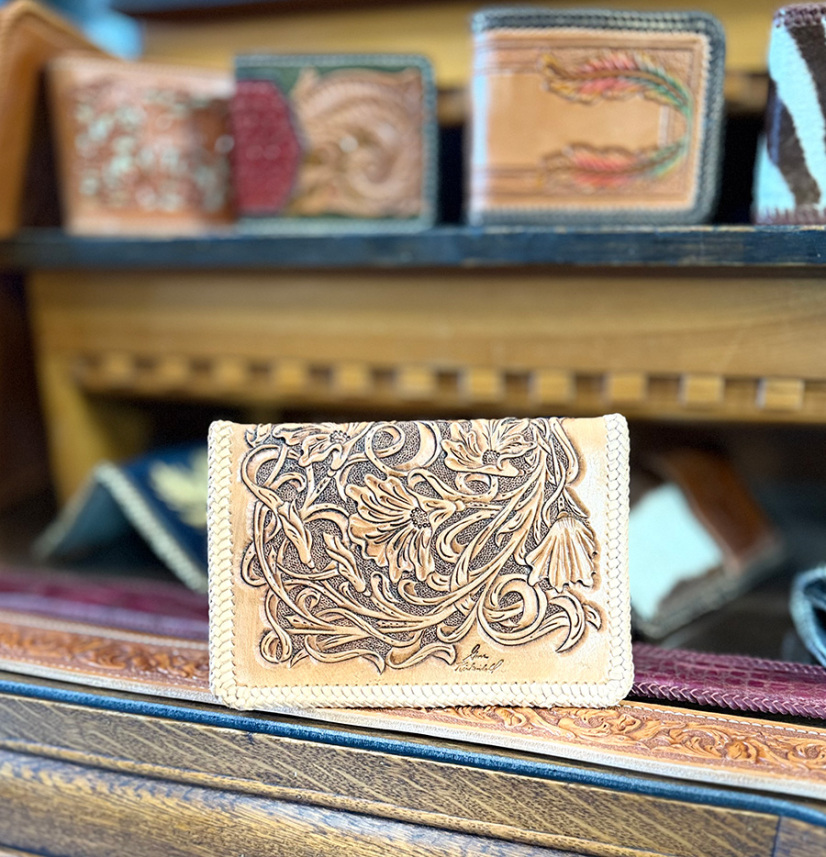 Hand-tooled leather wallet and belt by Gene Kirkendall