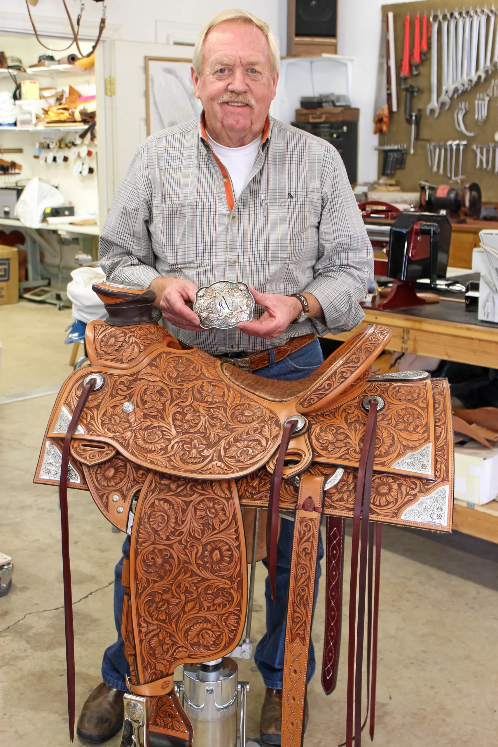 Custom floral-carved saddle by Gene Kirkendall